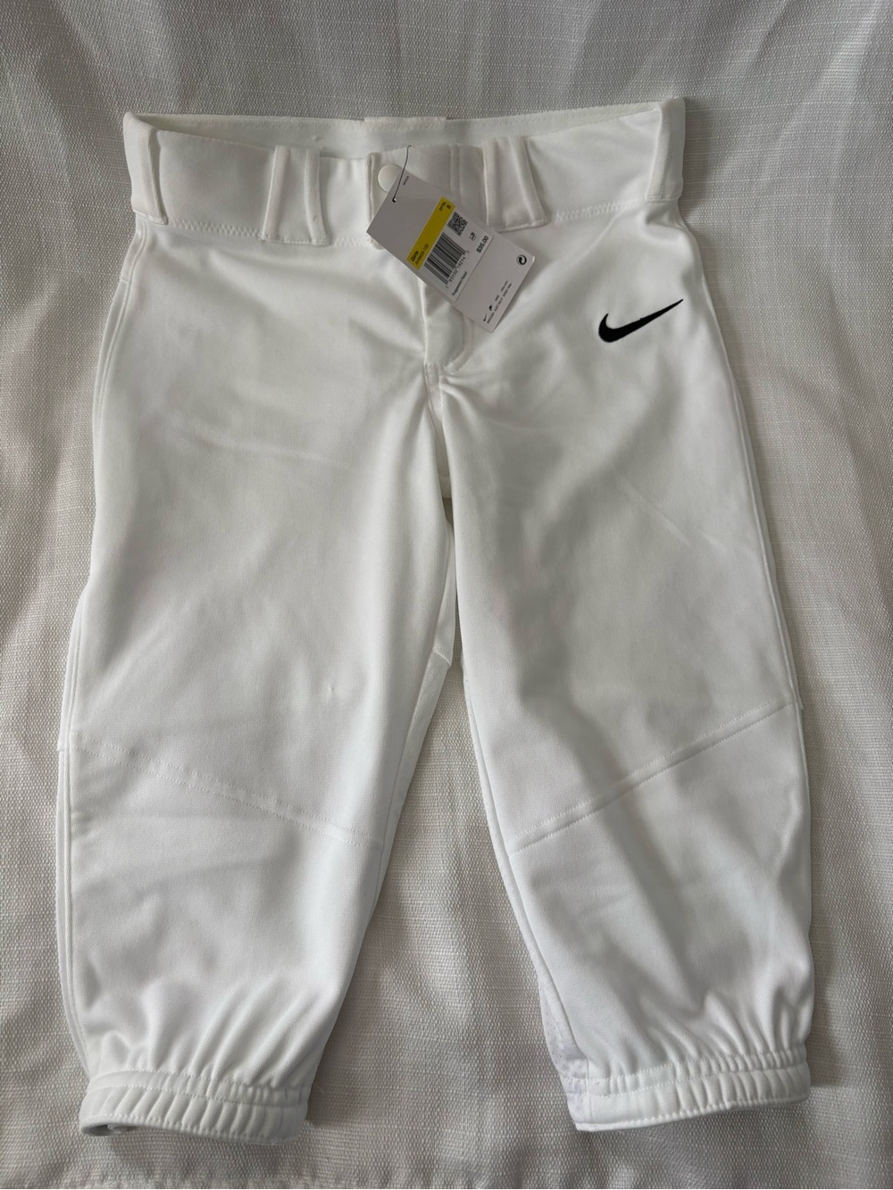 Nike White Kids Baseball Pants with Black Swoosh